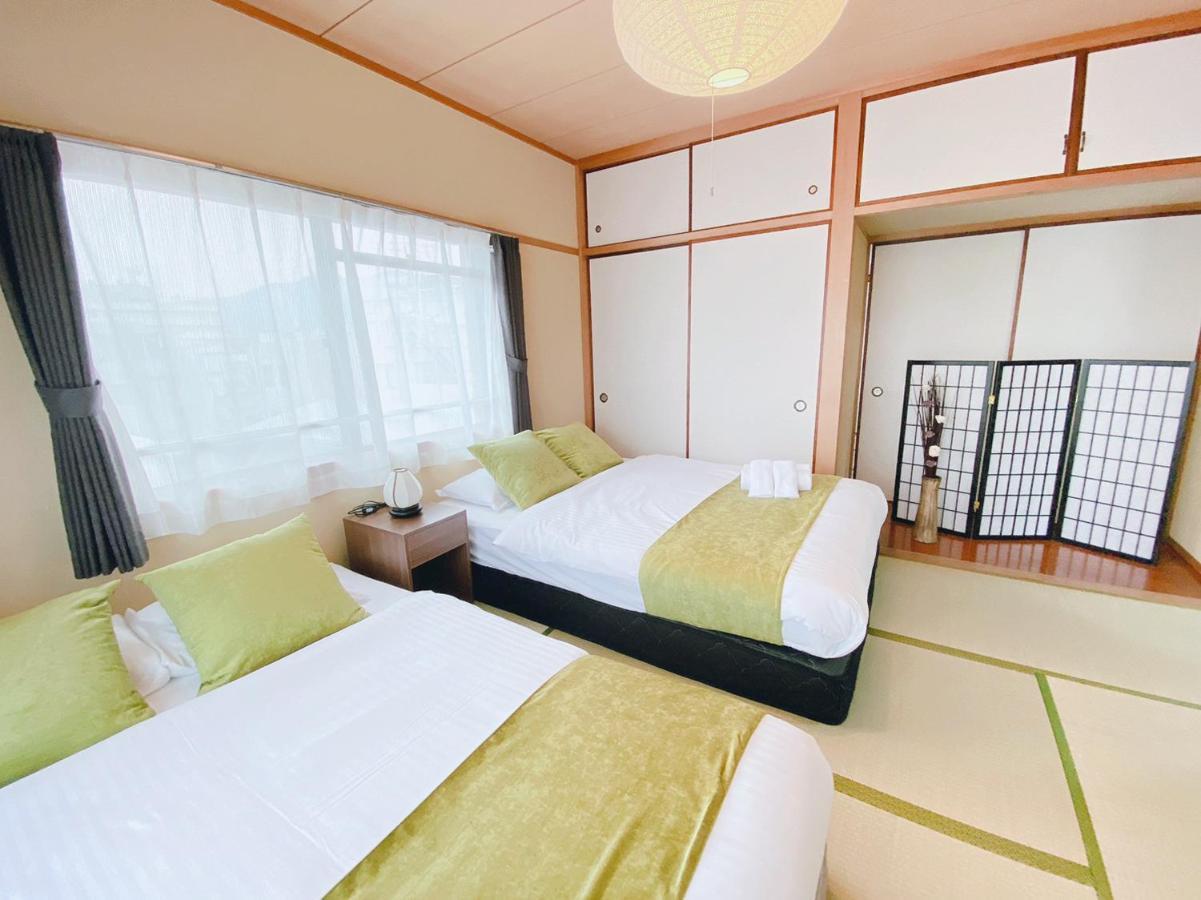 Ouchi Hotel Itsukaichi Hiroshima Exterior foto